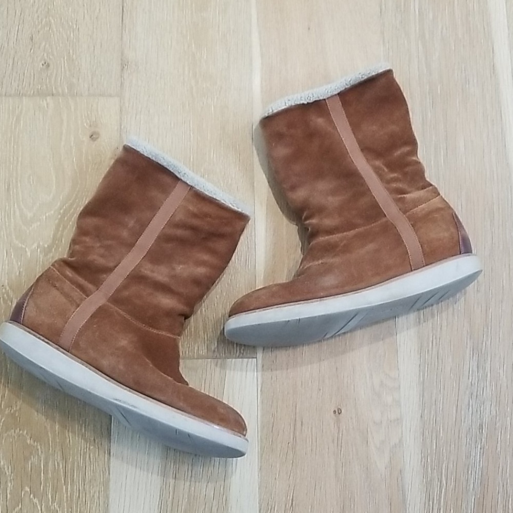 Ferragamo leather slide on boot.